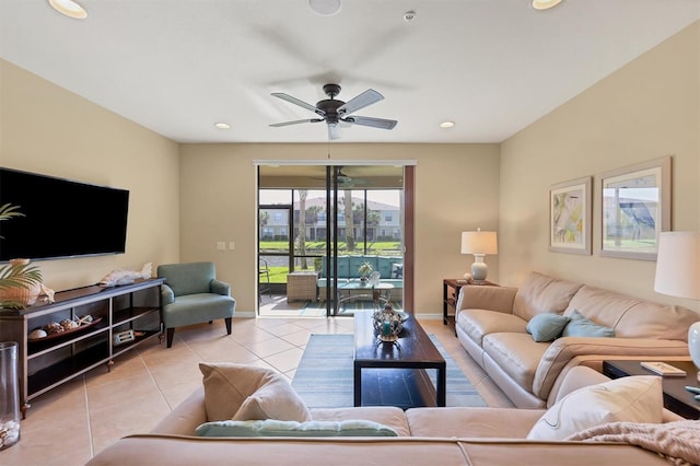 tiled living room with ceiling fan