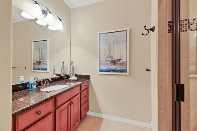 bathroom featuring tile floors and vanity with extensive cabinet space