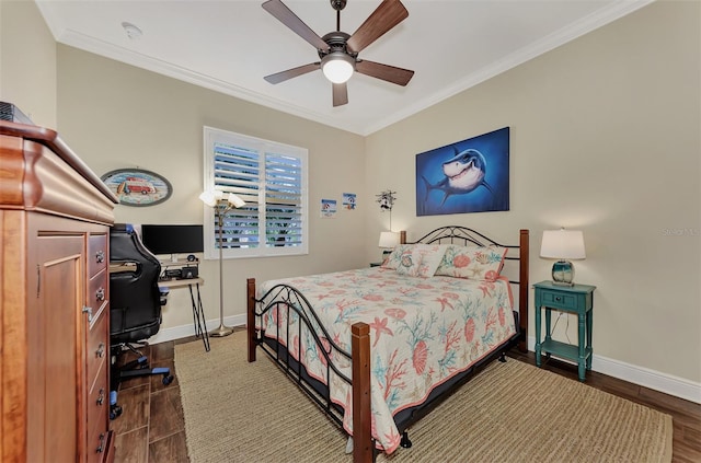 bedroom with ceiling fan, dark hardwood / wood-style flooring, and ornamental molding