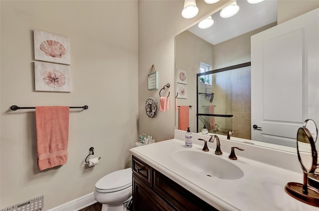 bathroom with toilet and oversized vanity