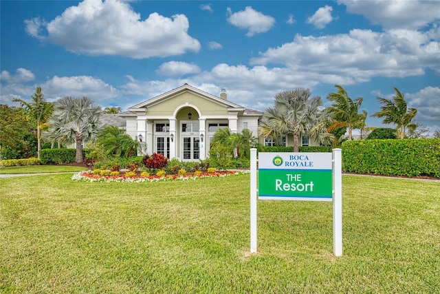 community sign with a yard