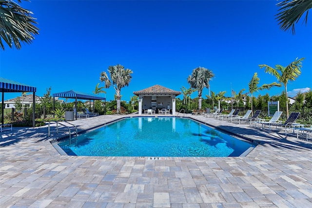 view of pool featuring a patio and a gazebo