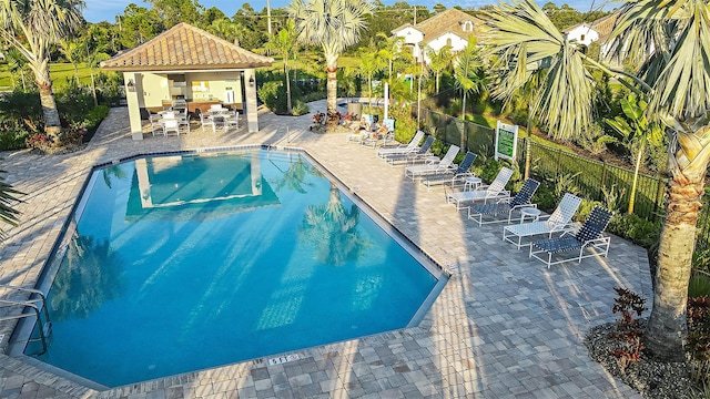 view of swimming pool featuring a patio