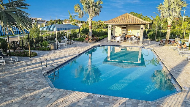 view of swimming pool featuring a patio