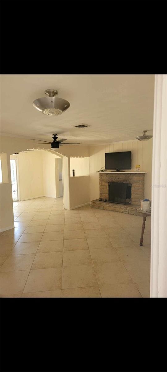 hallway featuring light tile flooring