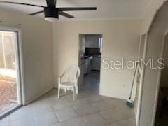 711A Pineland Ave, Venice, FL 34285 - empty room featuring a ceiling fan