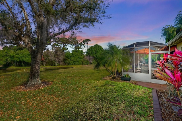 view of yard with a sunroom