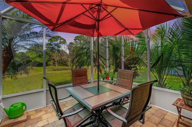 view of patio featuring outdoor dining area