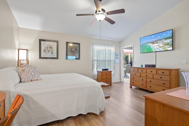 bedroom featuring light wood-type flooring, access to exterior, ceiling fan, and lofted ceiling