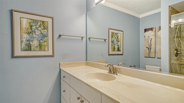 bathroom featuring vanity, crown molding, a textured ceiling, and toilet