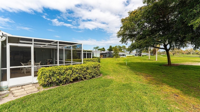 view of yard featuring a lanai