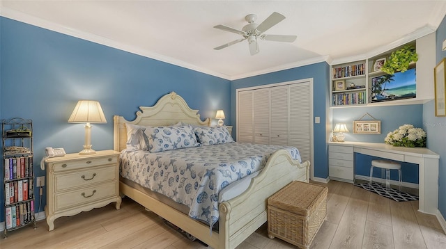 bedroom with crown molding, light hardwood / wood-style floors, ceiling fan, and a closet