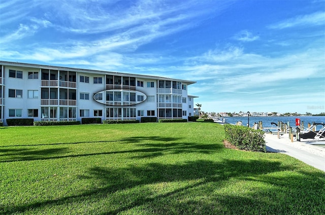 view of building exterior with a water view