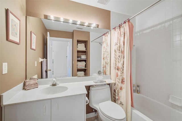 full bathroom with toilet, vanity, and shower / bath combination with curtain