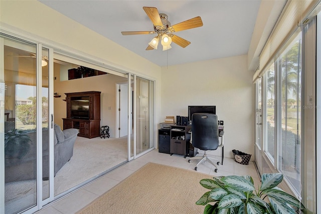 tiled office featuring ceiling fan and french doors