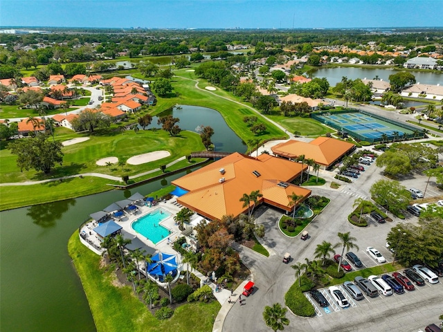 birds eye view of property featuring a water view