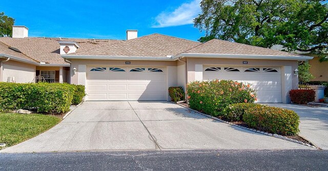 single story home with a garage