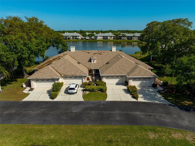 bird's eye view with a water view