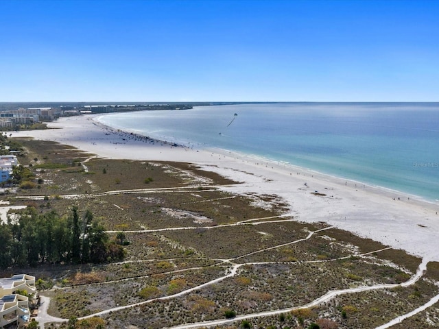 aerial view with a beach view and a water view