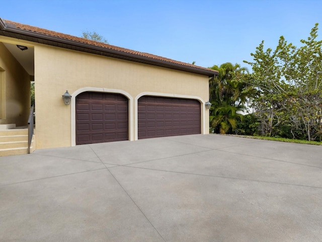 exterior space with a garage