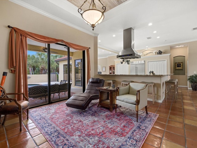 living room featuring ornamental molding and tile floors