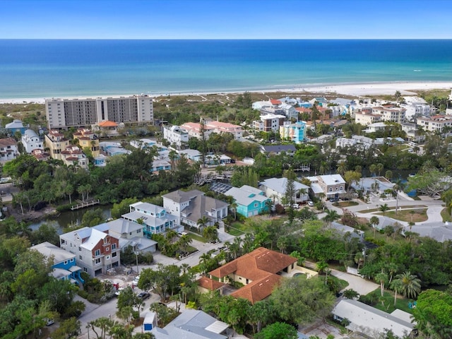 aerial view featuring a water view and a view of the beach