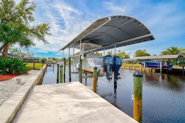 dock area with a water view