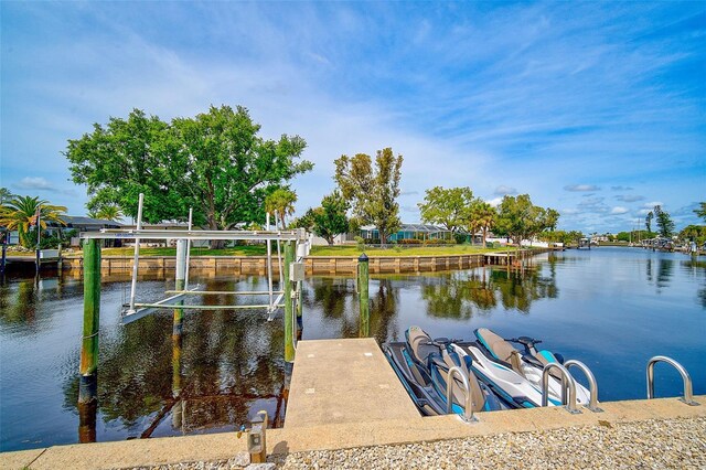 dock area featuring a water view