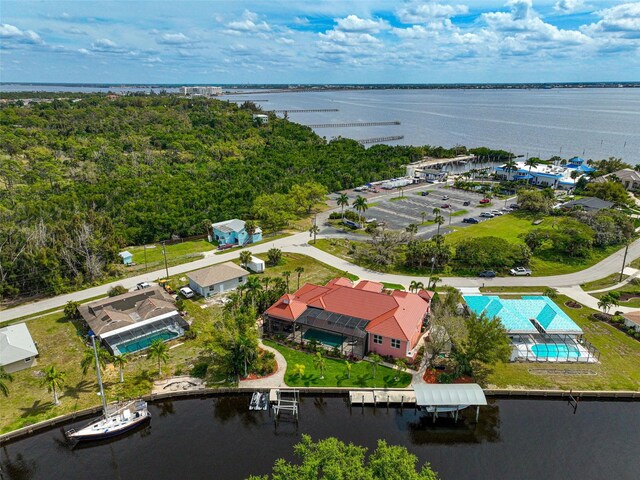 birds eye view of property featuring a water view