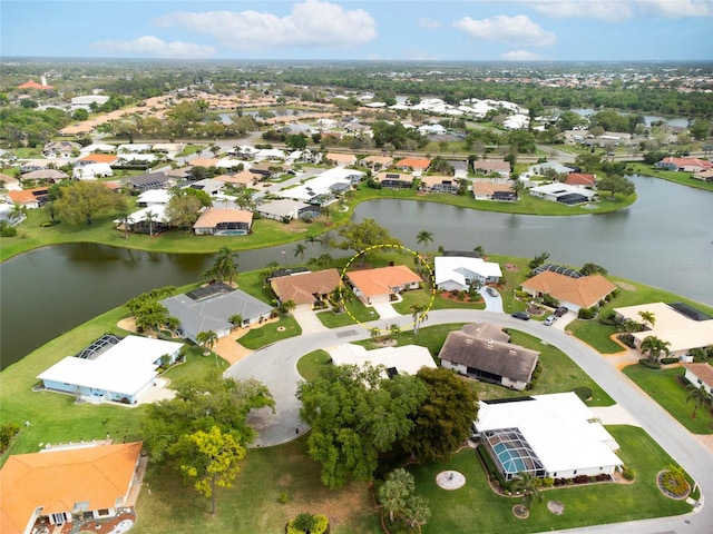 aerial view featuring a water view and a residential view