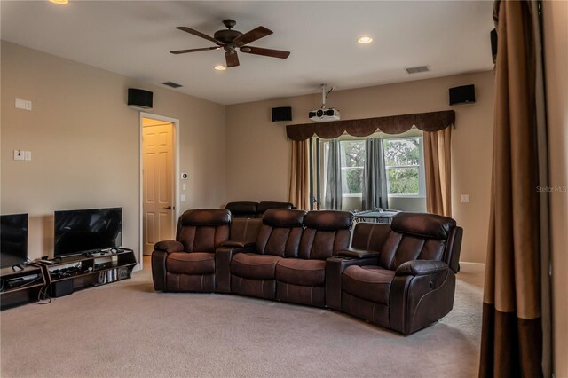 living room featuring ceiling fan and carpet floors