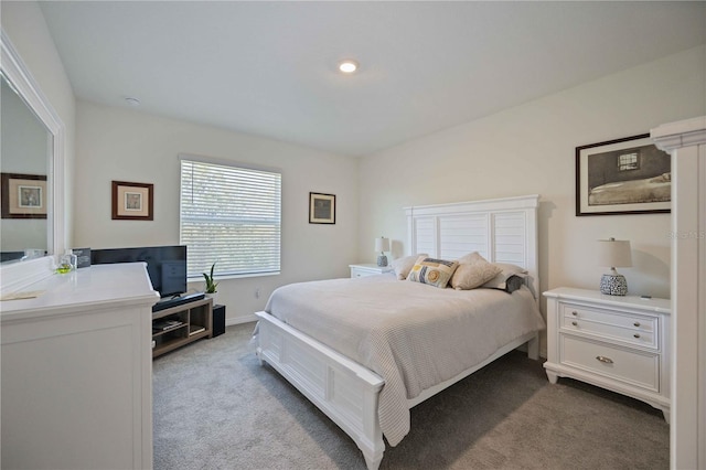 bedroom featuring light colored carpet