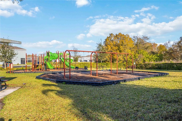 view of jungle gym with a lawn