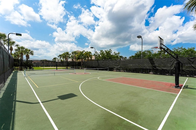 view of basketball court with tennis court