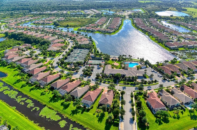 drone / aerial view with a water view