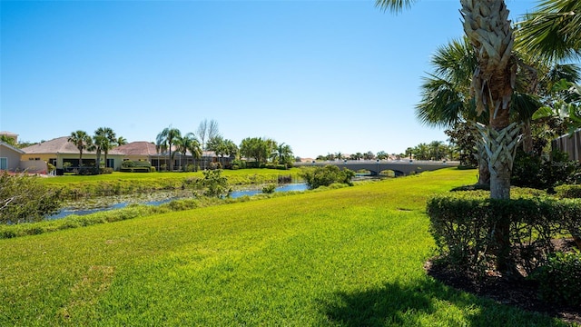 view of yard with a water view