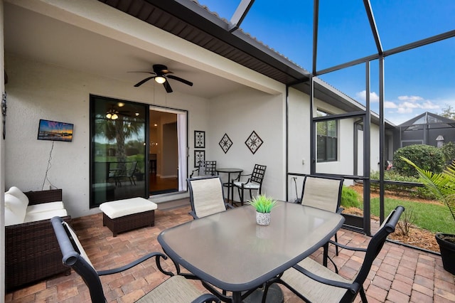 sunroom / solarium with ceiling fan