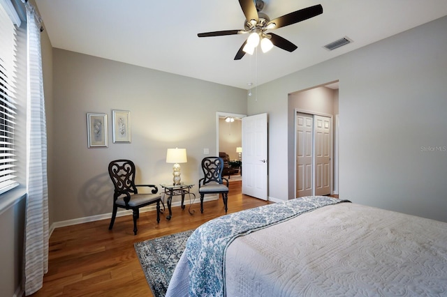 bedroom featuring a closet, ceiling fan, and hardwood / wood-style flooring