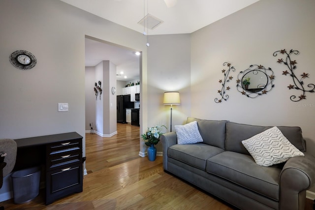 living room with wood-type flooring