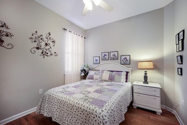 bedroom featuring ceiling fan and dark hardwood / wood-style floors