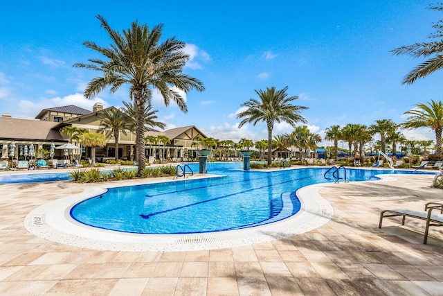 view of pool featuring a patio area