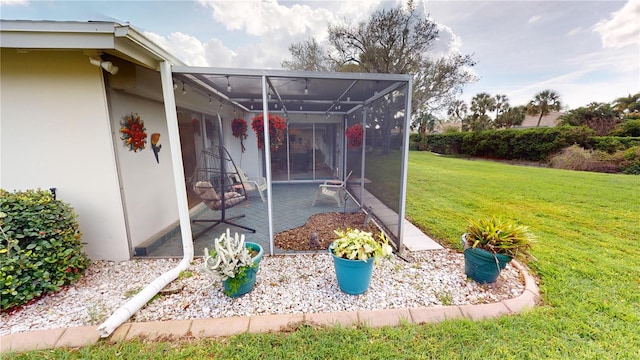 view of yard with a lanai and a patio