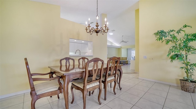 dining area with light tile floors, high vaulted ceiling, ceiling fan with notable chandelier, and sink