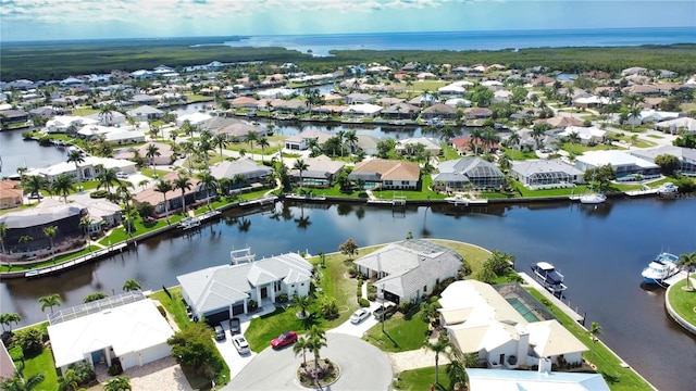 drone / aerial view with a water view