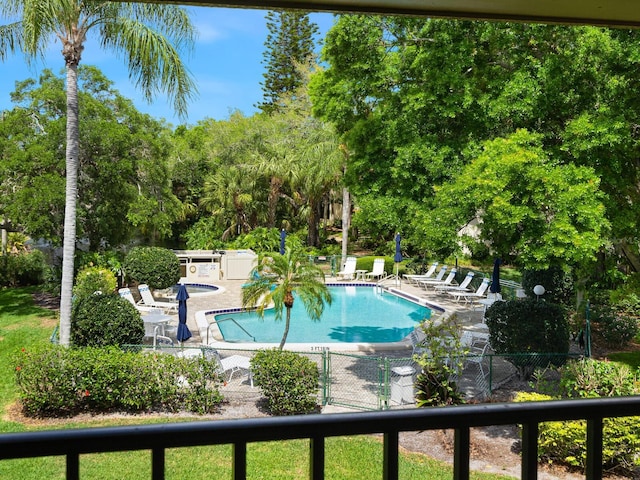 view of swimming pool with a patio