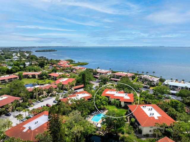 bird's eye view with a water view