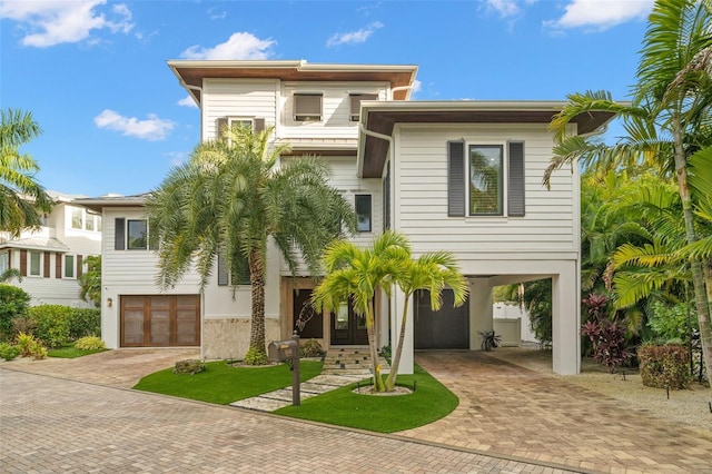 coastal home featuring a garage