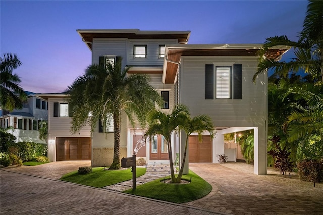 view of front of home with a garage