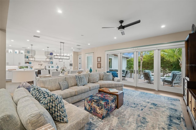 living room featuring ceiling fan