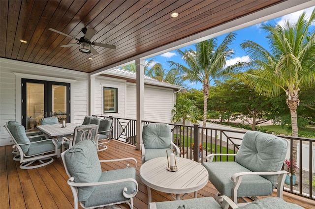 wooden deck with ceiling fan